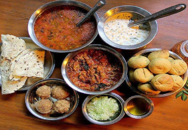 Authentic Rajasthani Cuisine – Enjoy Dishes Like Dal Baati Churma and Ker Sangri