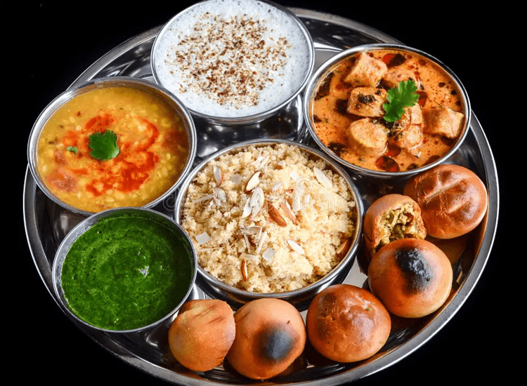 Authentic Rajasthani Cuisine – Enjoy Dal Baati Churma and Other Local Delicacies